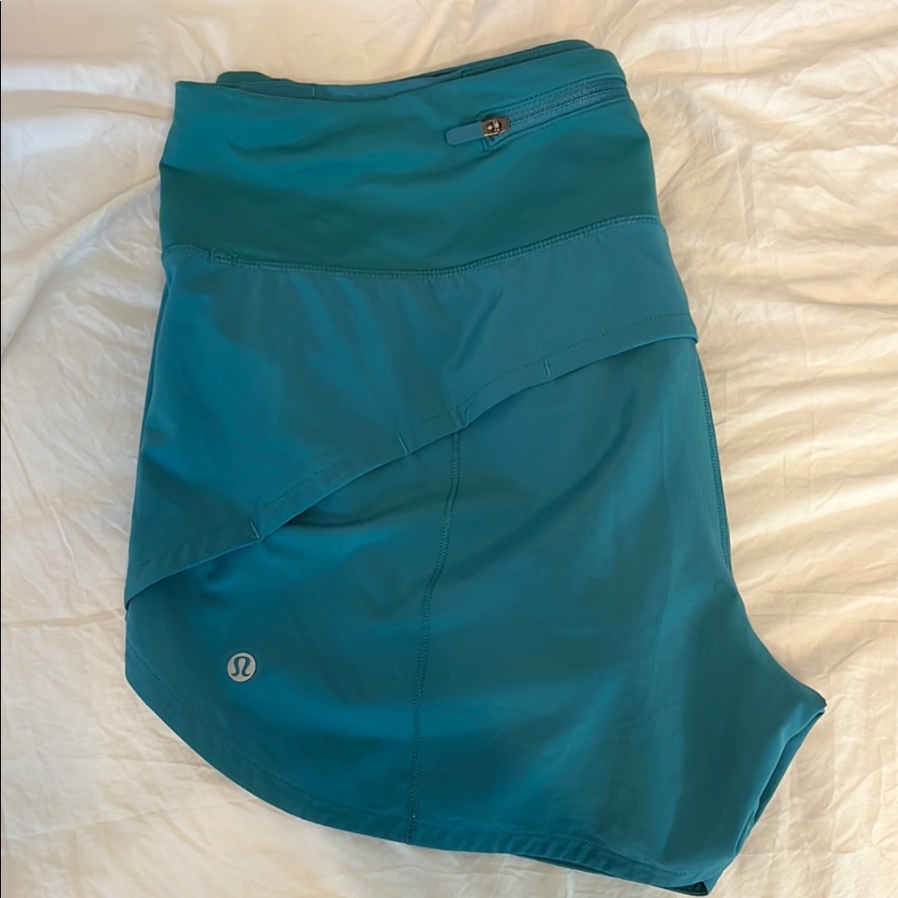Lululemon teal speed up shorts size 8